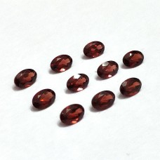 red garnet 6x4mm oval facet 0.55 cts